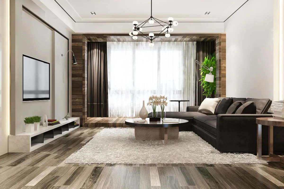 Modern living room with gray sofa, wooden coffee table, armchairs, and decorative lighting.