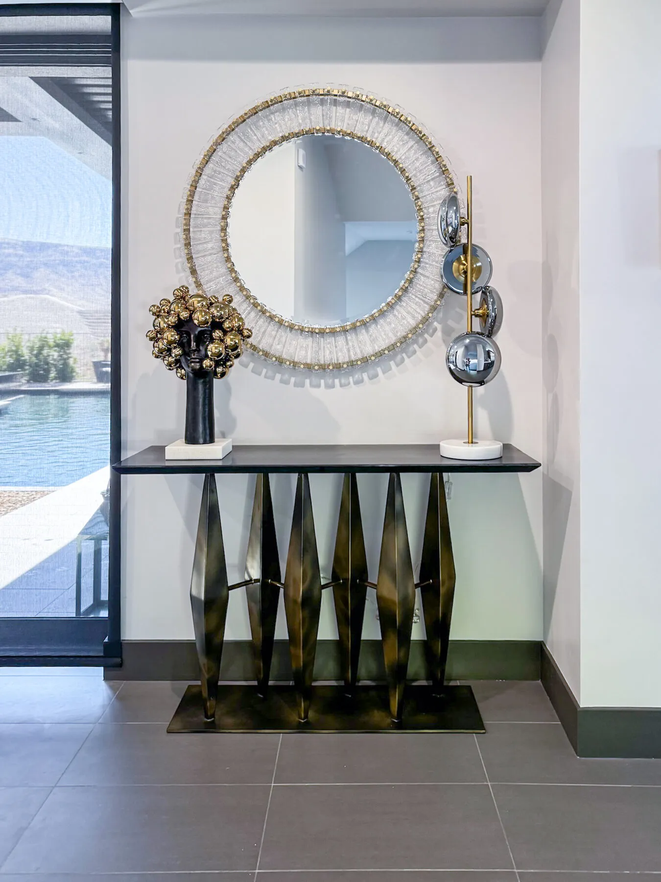 Bronze Console with Poolside View